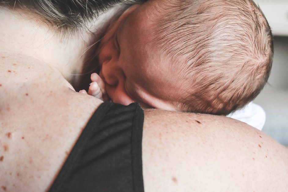 Why Your Back Still Hurts After Giving Birth - postpartum back pain relief