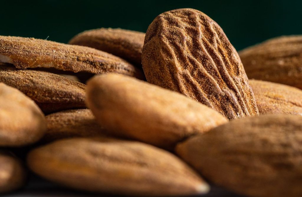 Almonds and black background