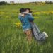 A couple in a green field